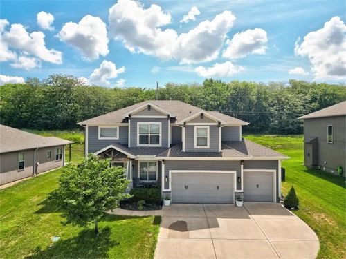 839 Creekmoor Pond Ln, Raymore, MO, 64083-8382 | Card Image
