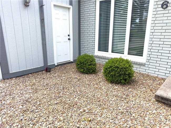 Doorway to property with brick siding | Image 5