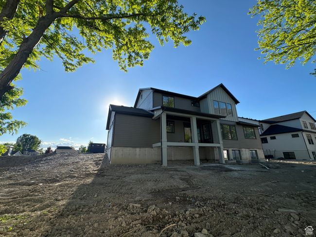 Back of property featuring board and batten siding | Image 37