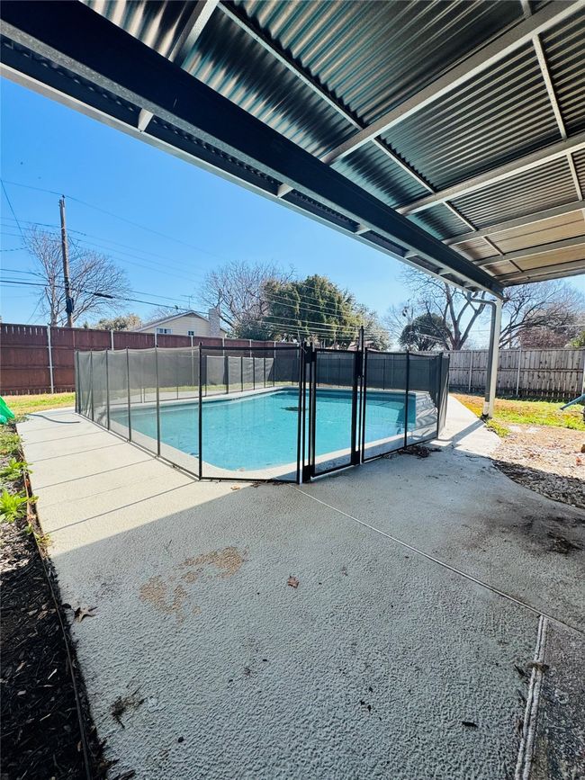 View of pool with a patio area | Image 20