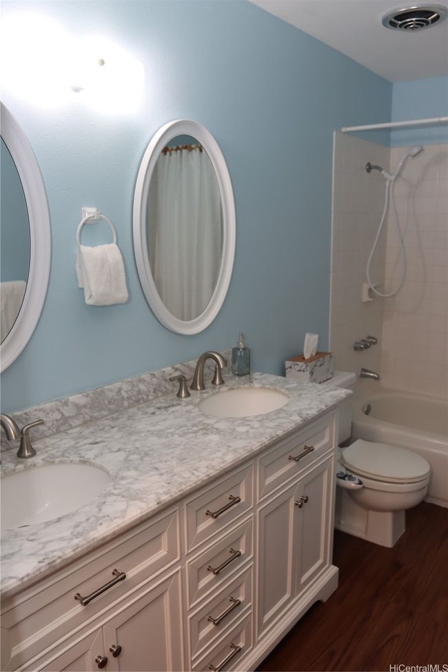 Downstairs bathroom with double sinks | Image 14