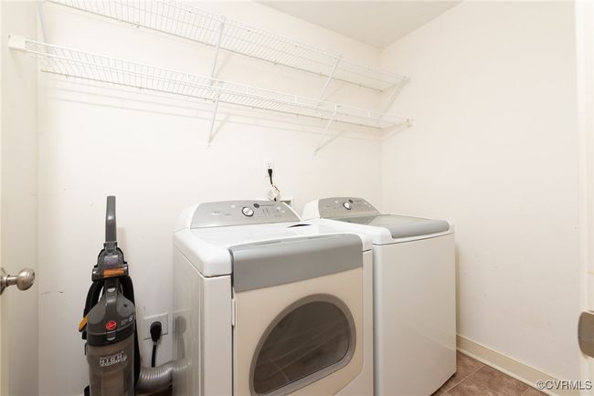 Utility room with washer and dryer | Image 27