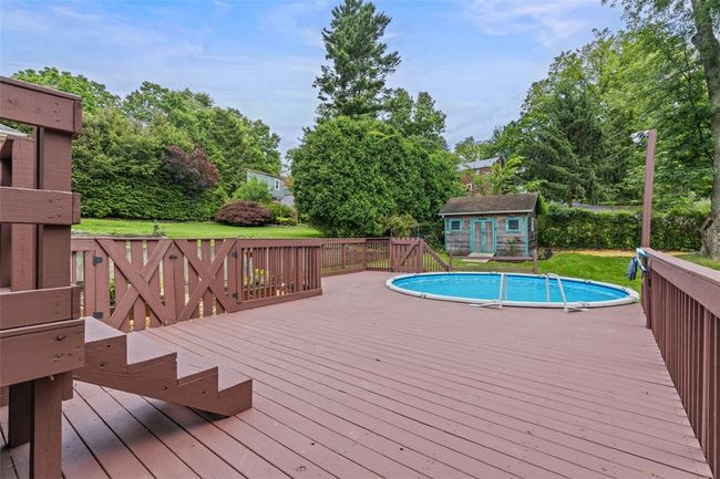 This pool deck is ready for your patio table and umbrella | Image 7