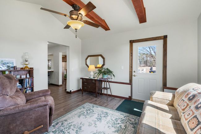 The sunroom has access to the back deck | Image 14