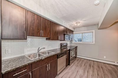 4 - 1622 28 Ave Sw, Condo with 3 bedrooms, 1 bathrooms and 1 parking in Calgary AB | Image 3