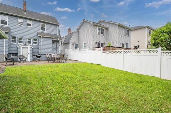 Back of property featuring a patio and a lawn | Image 6