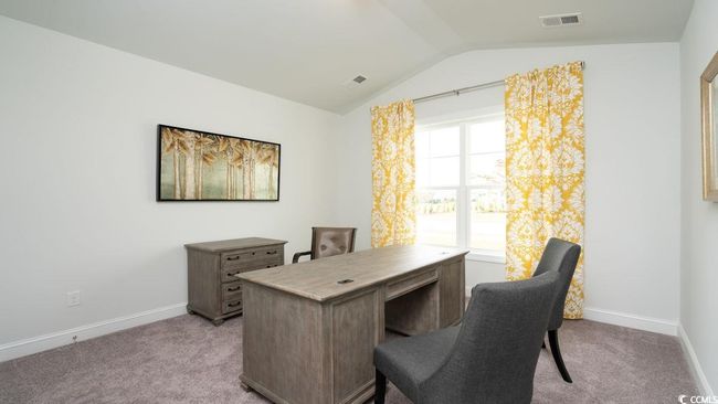 Office space with baseboards, light carpet, and vaulted ceiling | Image 26