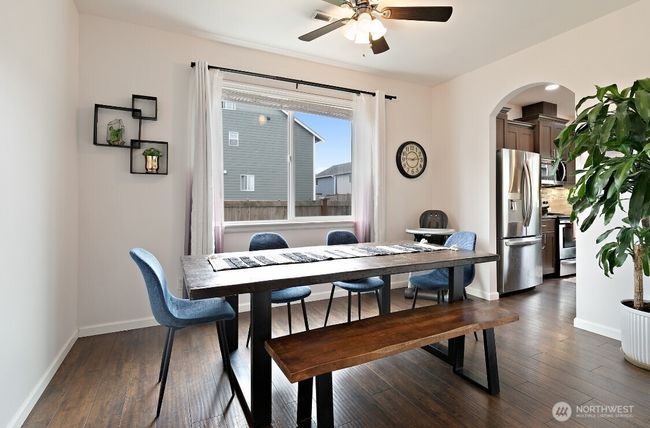 Dining area overlooks the backyard—perfect for family meals or hosting guests. | Image 4