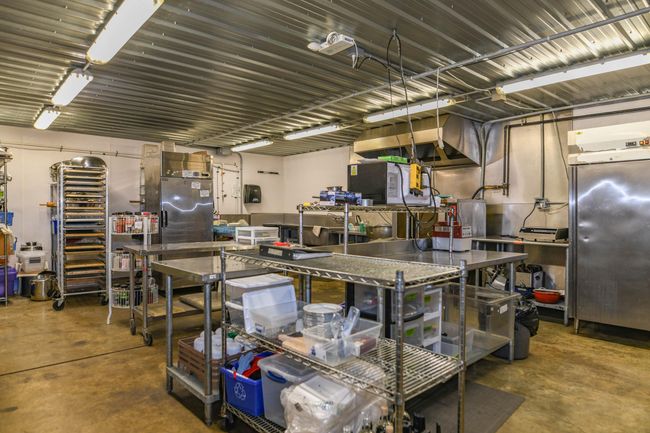 Kitchen featuring concrete floors | Image 35