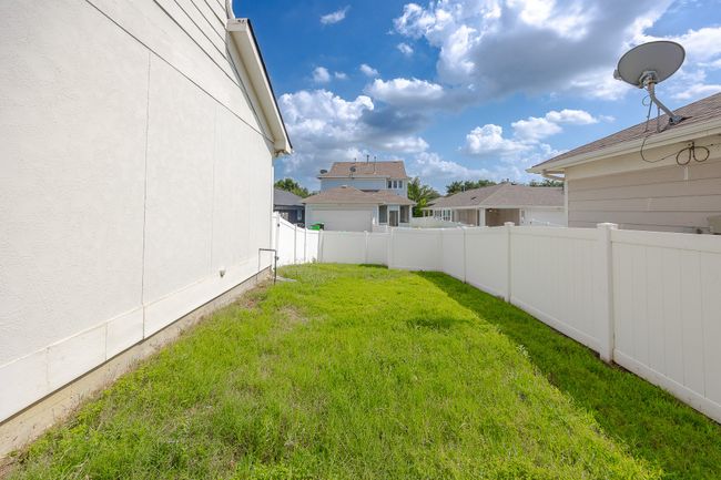 View of yard featuring a residential view | Image 35