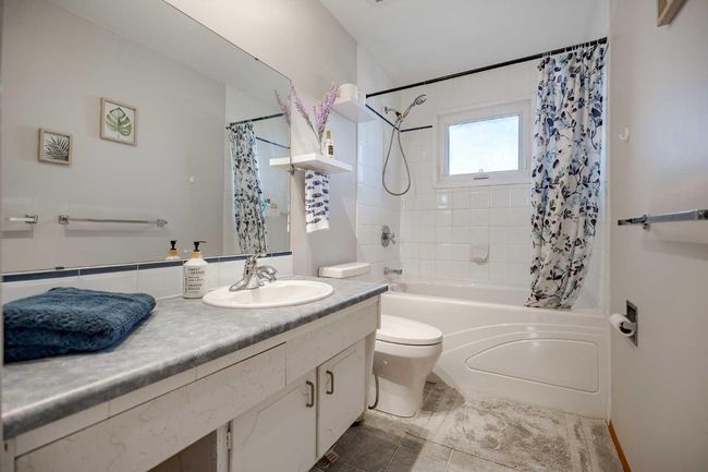 8408 Addison Dr Se, House other with 4 bedrooms, 2 bathrooms and 3 parking in Calgary AB | Image 14
