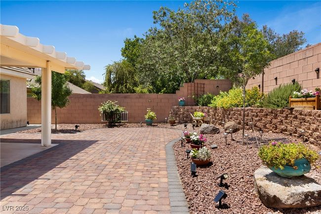 Fenced backyard featuring a patio | Image 44