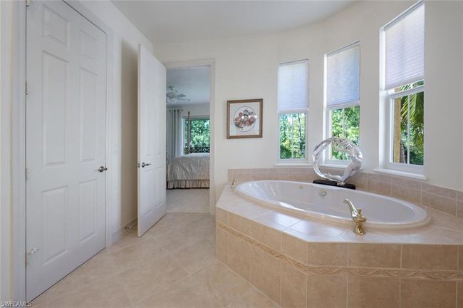 Walk-in closet w/custom built-ins | Image 34