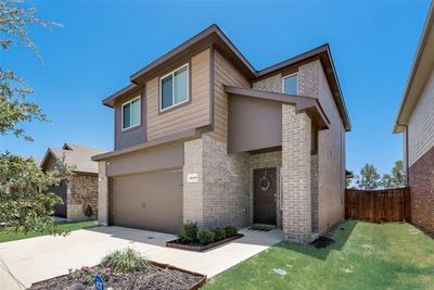 View of front of home with garage and front lawn | Image 1