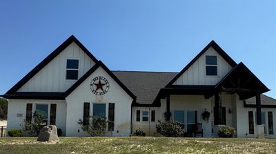 View of front of property featuring a porch | Image 1