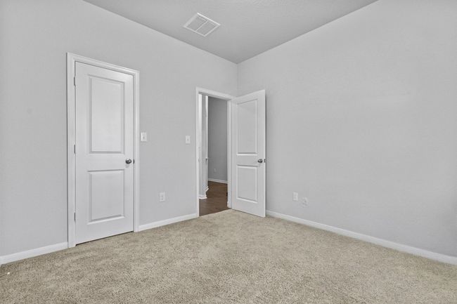 Secondary bedroom at the front of the house. | Image 24