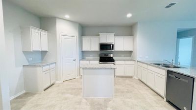 Kitchen - All Home and community information, including pricing, included features, terms, availability and amenities, are subject to change at any time without notice or obligation. All Drawings, pictures, photographs, video, square footages, floor plans, elevations, features, colors and sizes are approximate for illustration purposes only and will vary from the homes as built. | Image 2