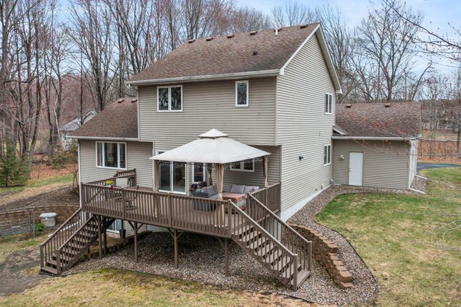 Deck with dual stairways to ground level | Image 33