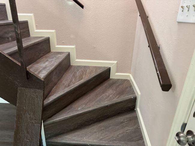 Stairway with a textured wall | Image 9