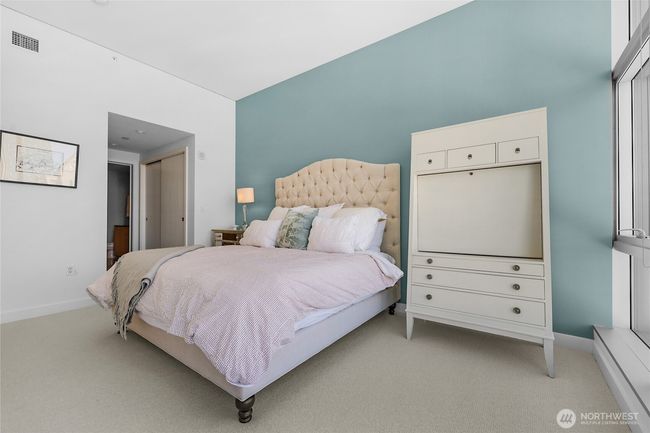 King sized primary bedroom with views | Image 21