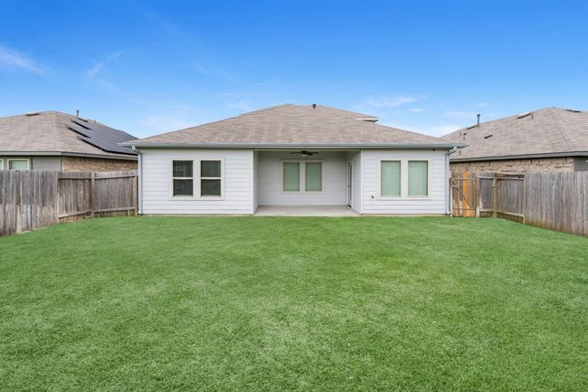 Sizeable yet manageable fully fenced backyard. | Image 23