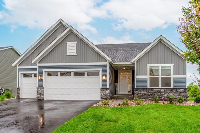 Positioned on a wide lot with lush green lawn and well-placed trees, this home offers both privacy and space in a beautifully planned neighborhood. | Image 45