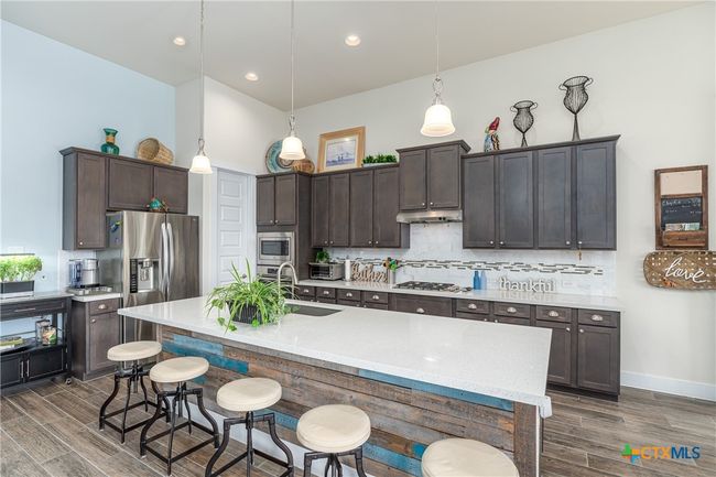 Kitchen from back door. | Image 13