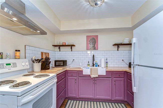 large fully functional kitchen with everything you need for a small or large meal | Image 9