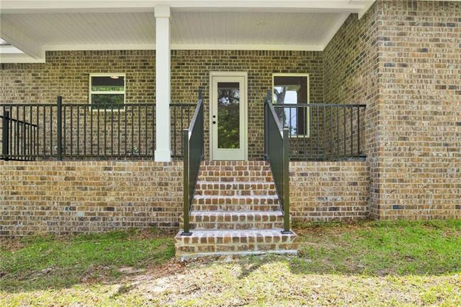 Property entrance featuring brick siding | Image 32