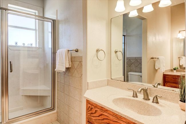 Bathroom 3. Upstairs bathroom with dual vanities, bath/shower combination. | Image 22