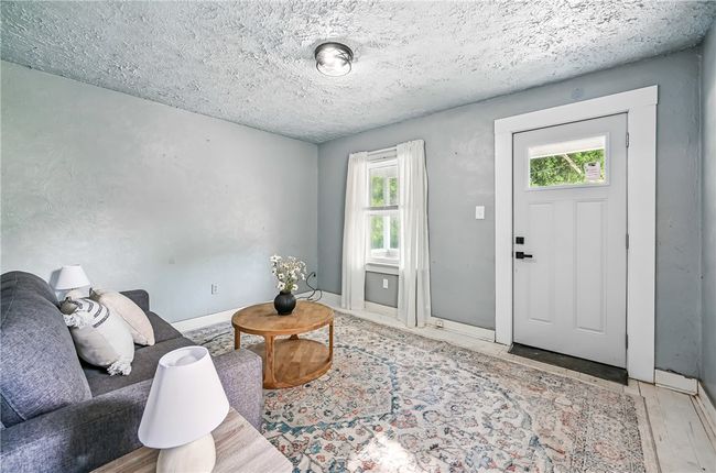 Front entry to living room | Image 7