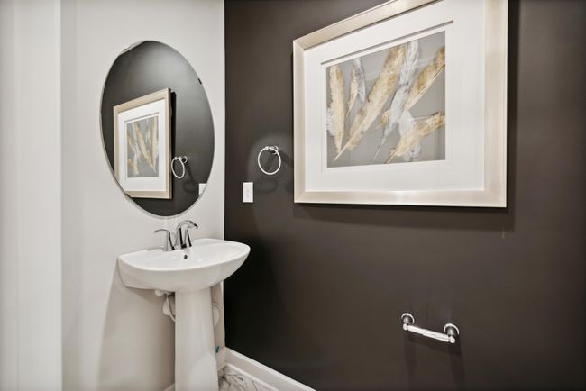 Conveniently located half bath on the main level. *Photos are of another model, colors and finishes may vary. | Image 7