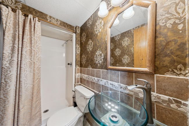 Lower level 3/4 bathroom with a walk-in shower | Image 21