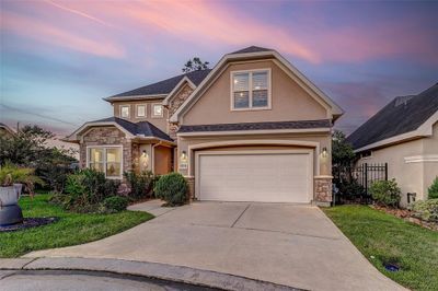 Welcome to 25718 N Muirfield Bend Court, Spring, TX 77389. Nestled within a gated community. | Image 1