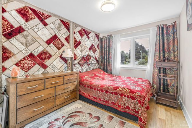 Bedroom featuring light wood-type flooring | Image 21