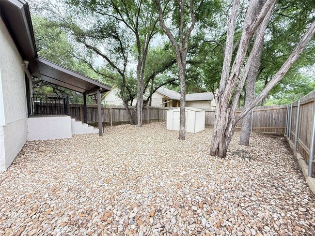 This is a larger lot for a condo with a private yard not visible by street or neighbors | Image 29