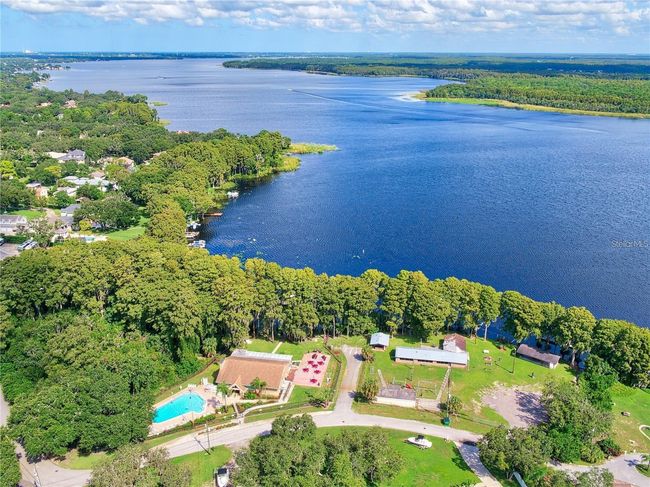 Within minutes of Gulf Beaches and fronting on Lake Tarpon, but Highland Lakes is safely 86 ft above the flood plain~ | Image 47