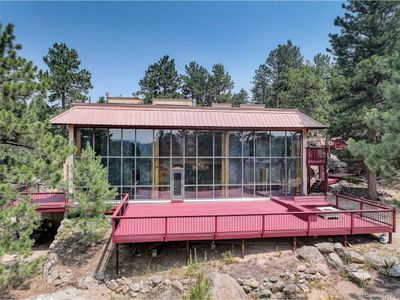 8791 Grizzly Way, House other with 3 bedrooms, 2 bathrooms and null parking in Evergreen CO | Image 1