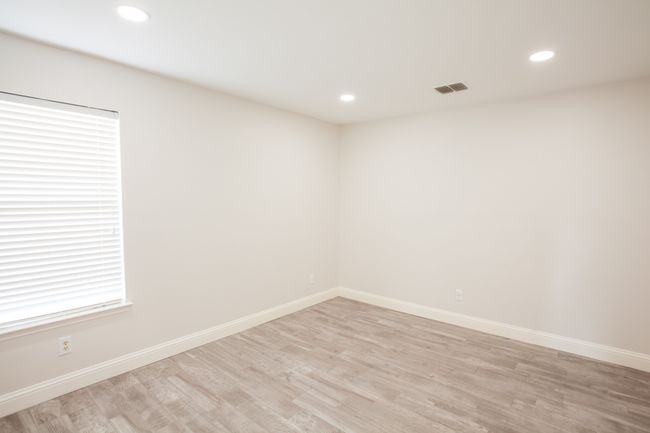 Spare room with light wood-type flooring and recessed lighting | Image 30