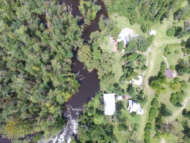 10012 Sw Windsong Way, Home with 3 bedrooms, 3 bathrooms and null parking in Blountstown FL | Image 81