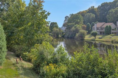 Beautiful water view from deck, living room, and both bedrooms. | Image 3