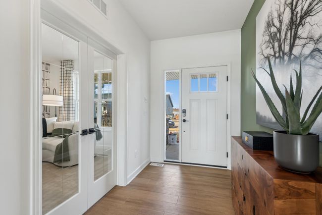 (Photo of a decorated model home, actual features may vary) A bright, welcoming foyer! | Image 12