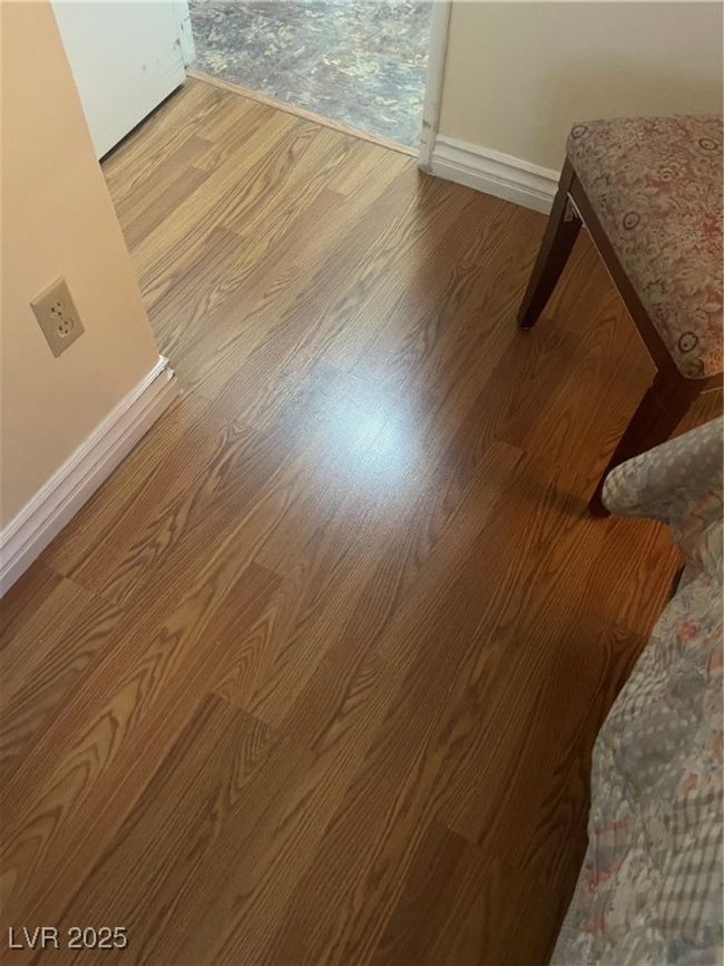 Details with baseboards and wood finished floors | Image 11