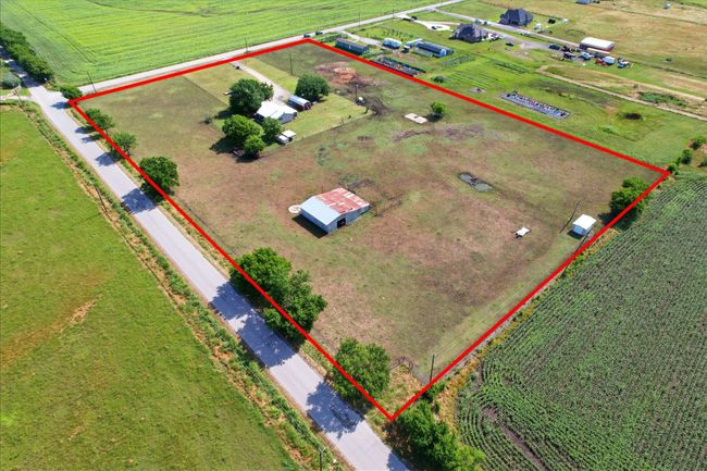View of rural area with property parcel outlined and large plots for crops | Image 6
