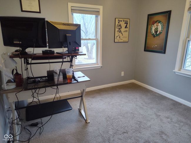 bedroom with a wealth of natural light, baseboards, and carpet floors | Image 10