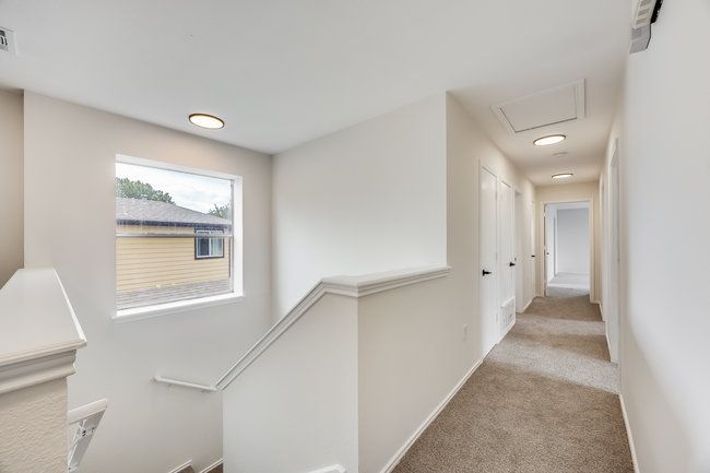 Corridor with carpet, an upstairs landing, and baseboards | Image 23