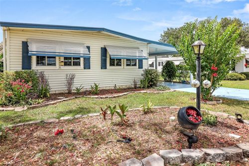 919 Weeping Willow Ave, LADY LAKE, FL, 32159-2382 | Card Image