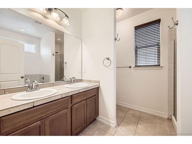 1945 Basil St, House other with 4 bedrooms, 3 bathrooms and null parking in Strasburg CO | Image 17