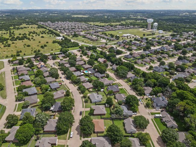 Aerial overview of property's location with nearby suburban area | Image 33