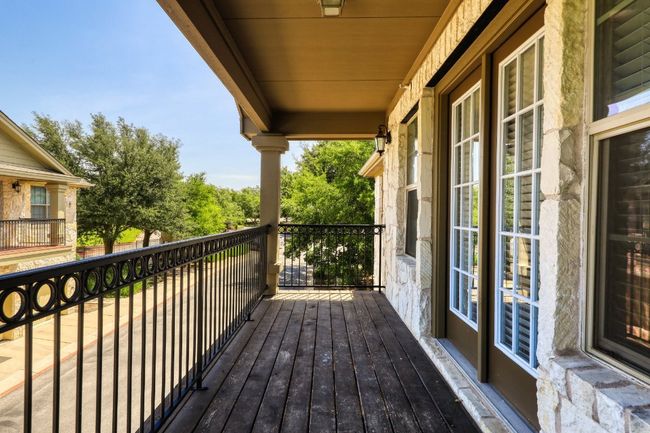Long balcony with french doors leading from the family room | Image 17